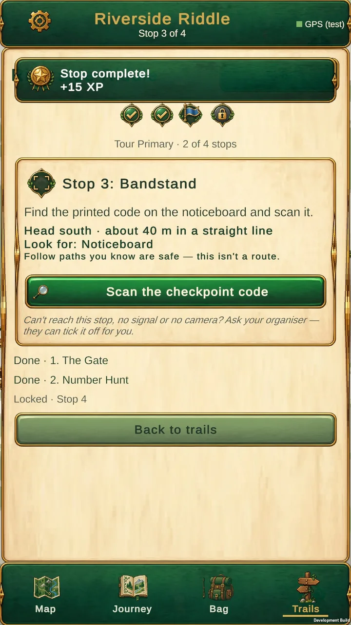 A trail stop asking you to scan a checkpoint code